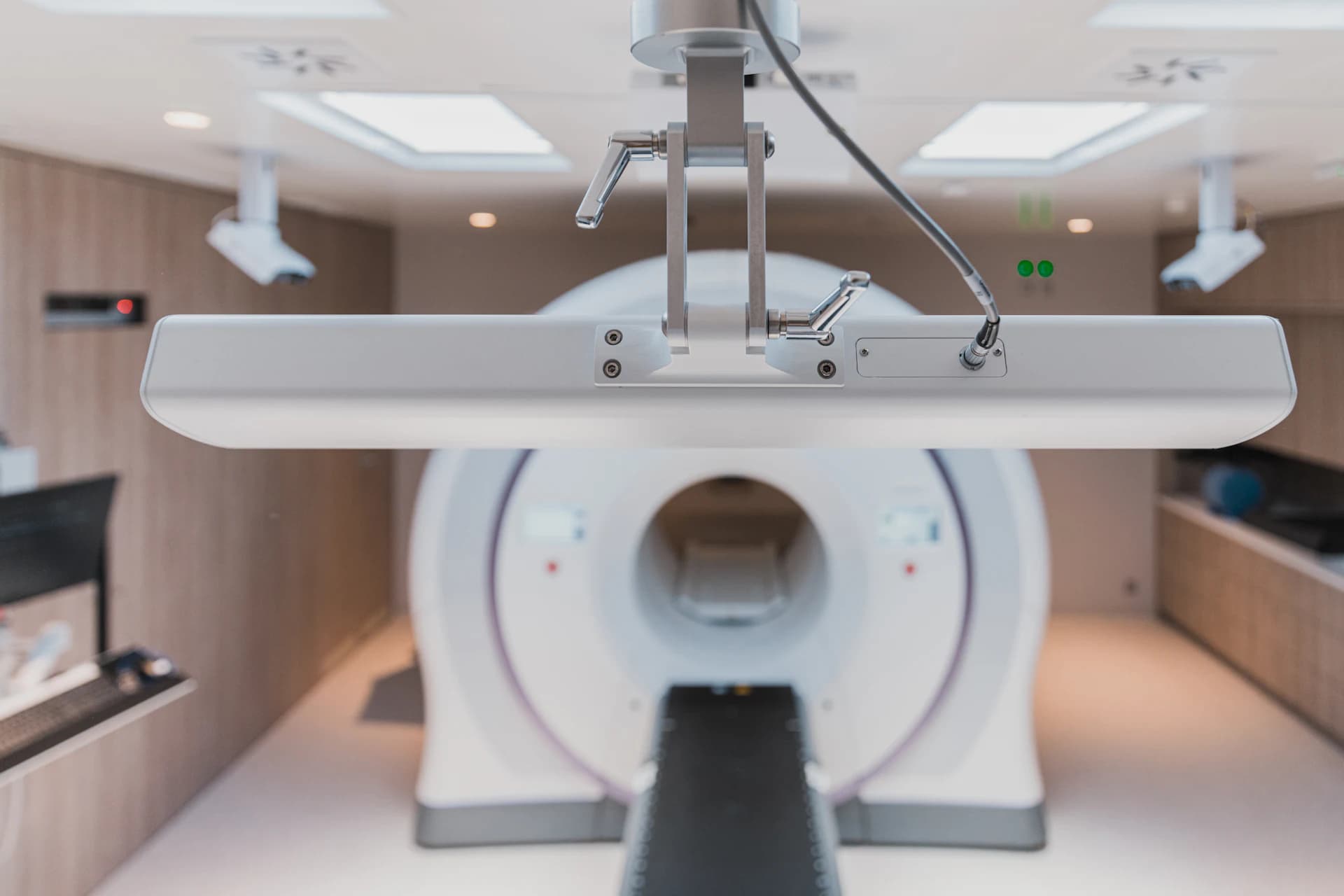 A treatment gantry in a shielded room.
